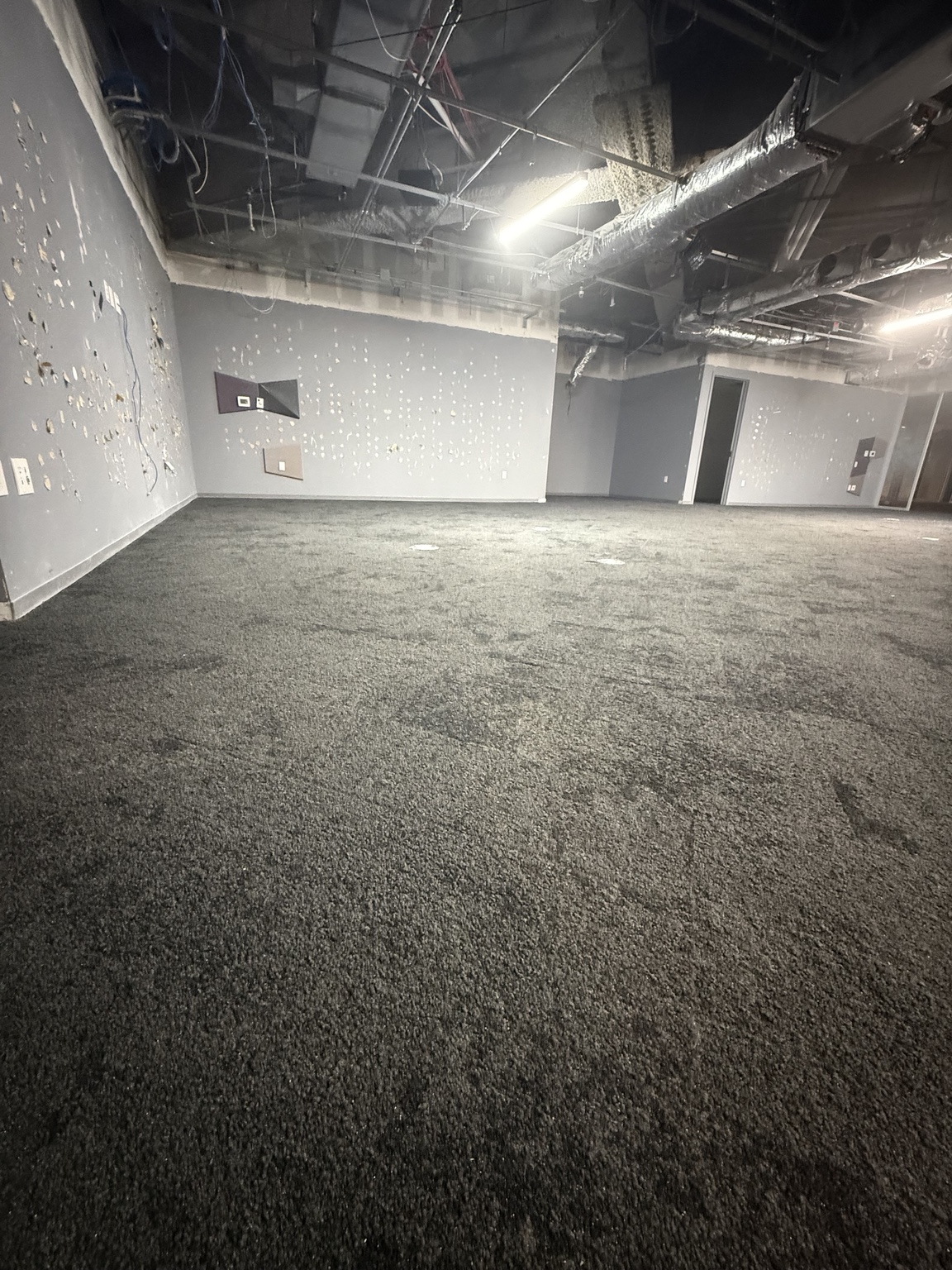 Same commercial tiled floor after cleaning